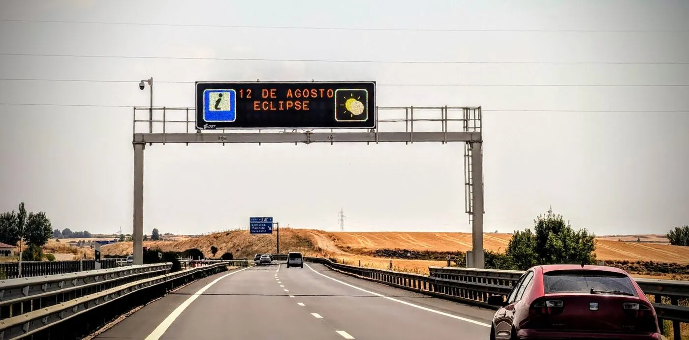 Spanish highway information sign announcing the eclipse on 12 August
